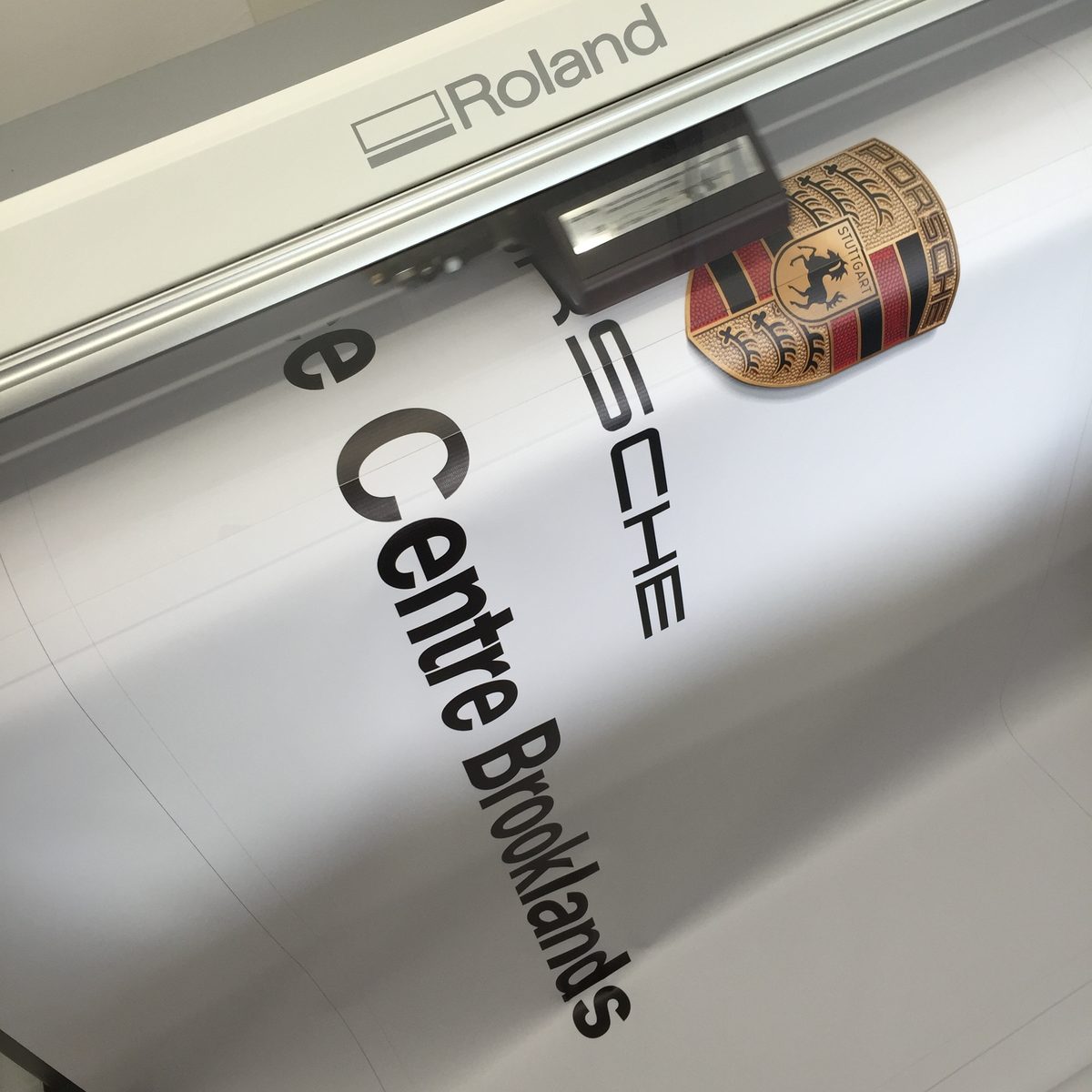 Porsche Centre Brooklands graphics being produced on a Roland machine