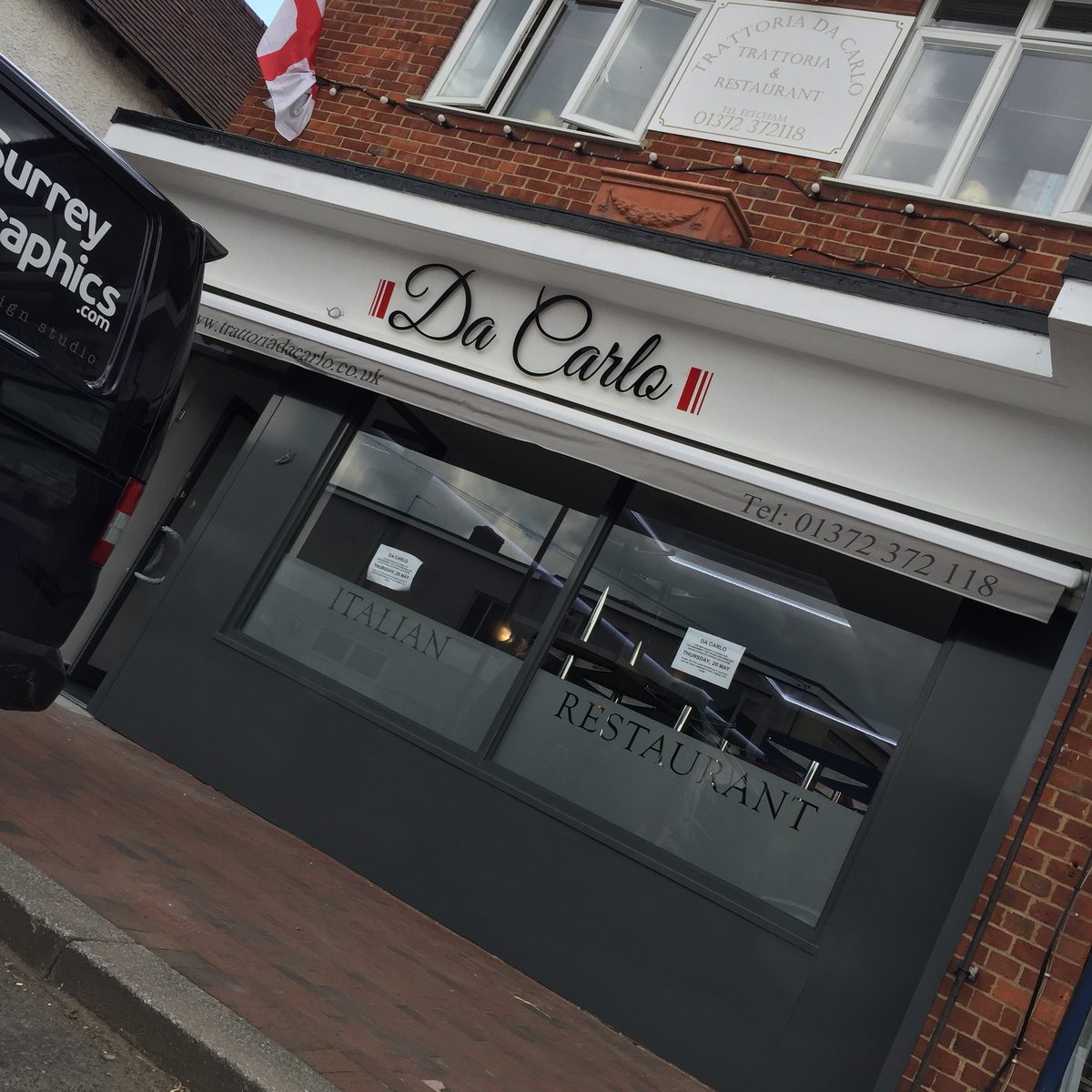 Da Carlo restaurant front with 'Italian Restaurant' lettering etched into frosted window film
