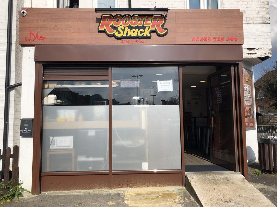 Rooster Shack takeaway shopfront with frosted privacy film across the lower half of the windows