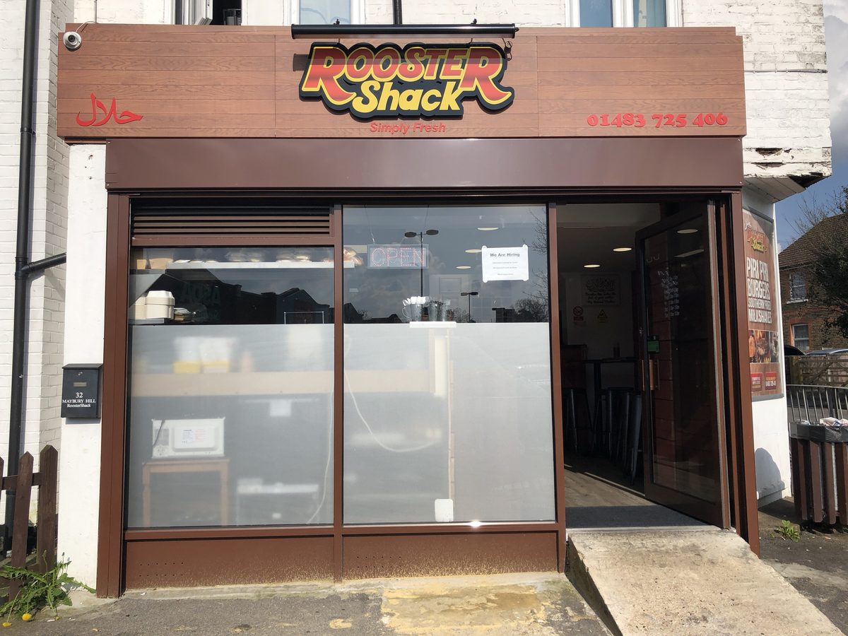Rooster Shack takeaway shopfront with frosted privacy film across the lower half of the windows
